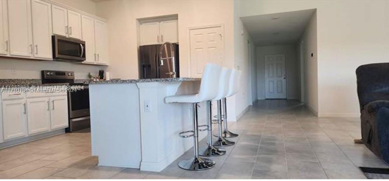 Furnished interior view inside a new home in Lake Lucerne, Winter Haven (Image 8). Furnished interior view inside a new home in Lake Lucerne, Winter Haven (Image 8).