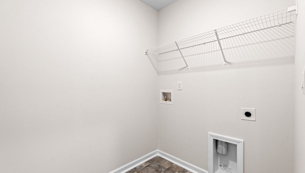 Representative unfurnished interior of a home built from the ELSTON by D.R. Horton in Harrier Point, Woodruff (Image 27).