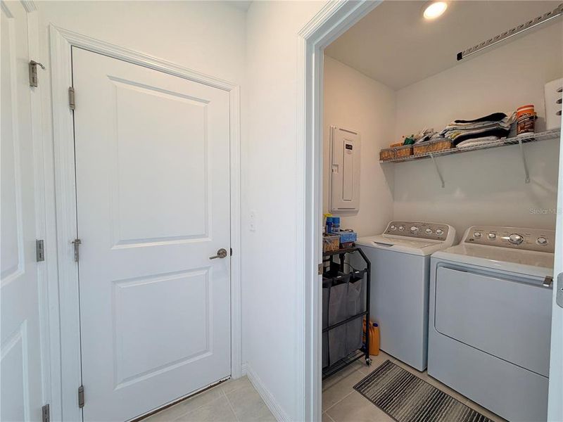 Furnished interior view inside a new home in Westview Community Group Page, Kissimmee (Image 4).