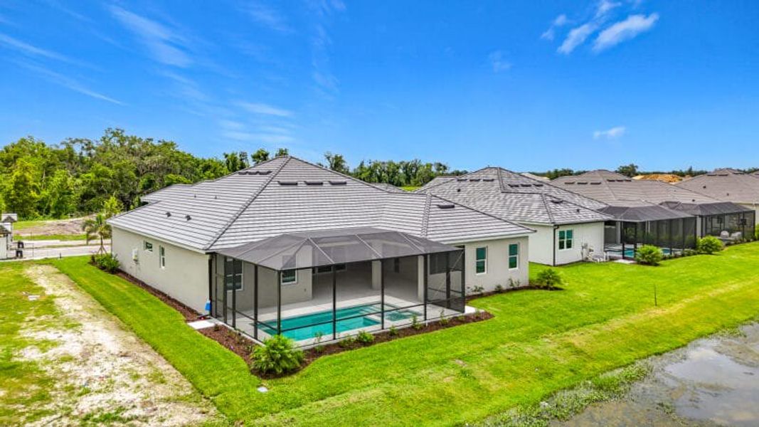 Exterior details and patio area of a home in River Preserve Estates, Parrish (Image 30).