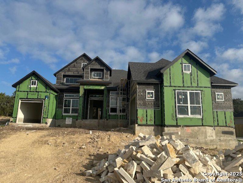 Front exterior of a new home in Heimer Estates at Garden Ridge, San Antonio, TX, highlighting curb appeal (Image 10).