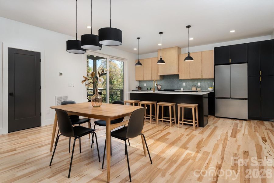 dining area and door to 1/2 bath