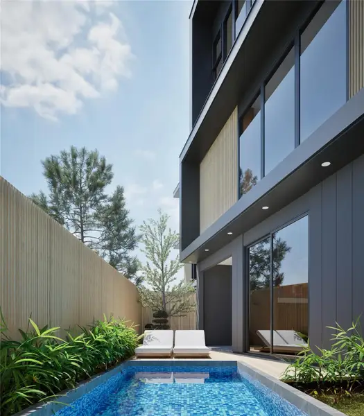View of swimming pool featuring a patio area and a fenced backyard View of swimming pool featuring a patio area and a fenced backyard