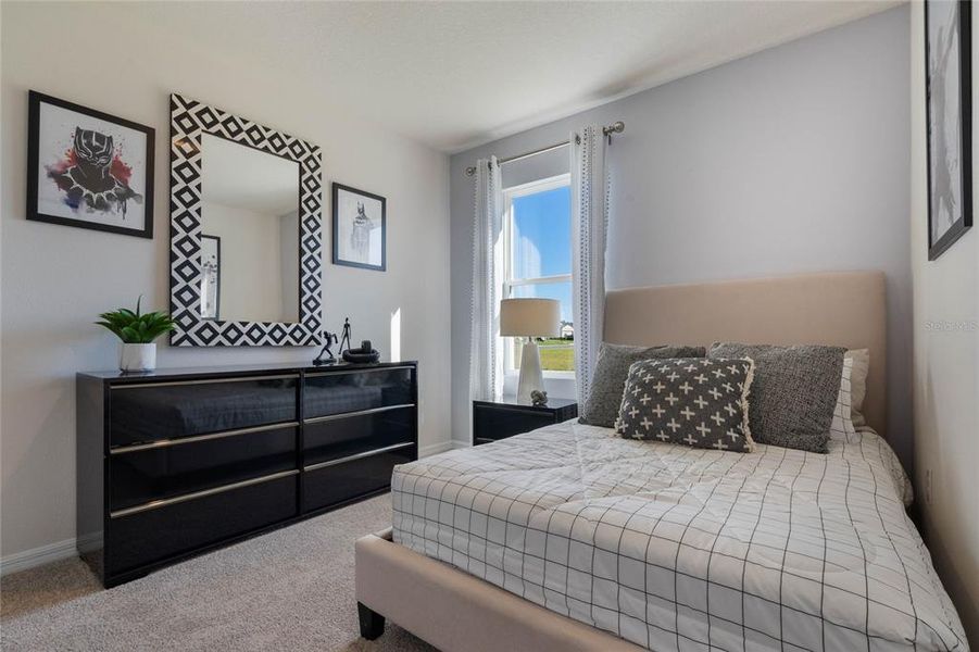 Furnished interior view inside a new home in Lake Deer Estates, Poinciana (Image 20).