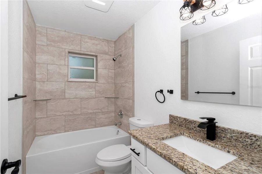 Furnished interior view inside a new home in , Dunnellon (Image 8).