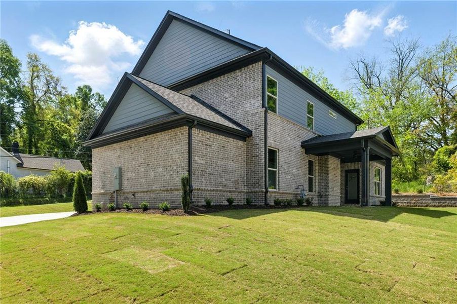 Front exterior of a new home in , Buford, GA, highlighting curb appeal (Image 29).