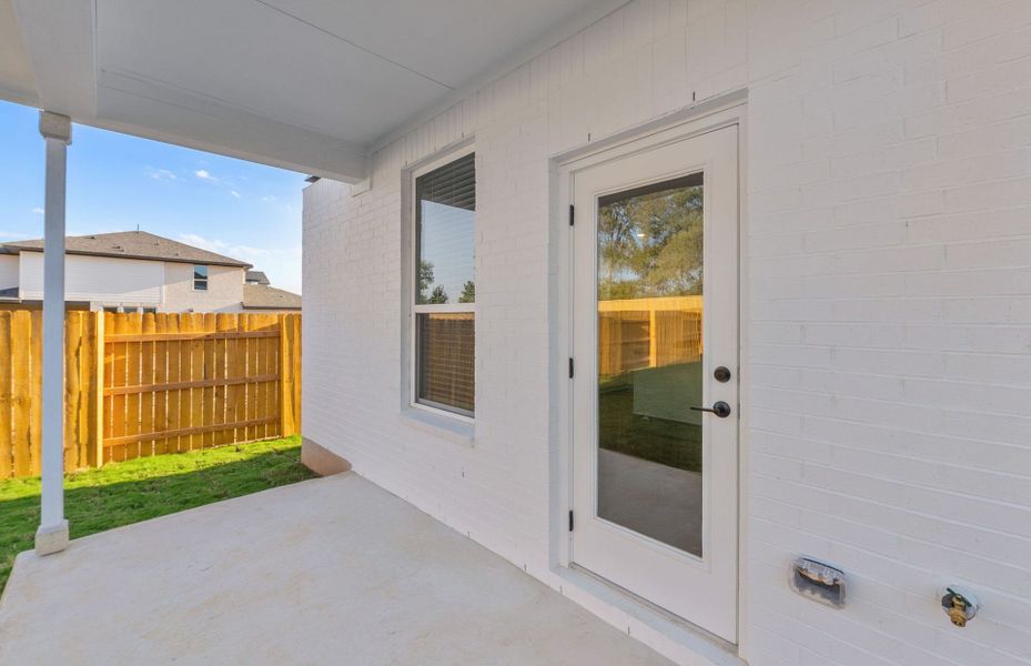 Exterior details and patio area of a home in Woodside, Georgetown (Image 3).