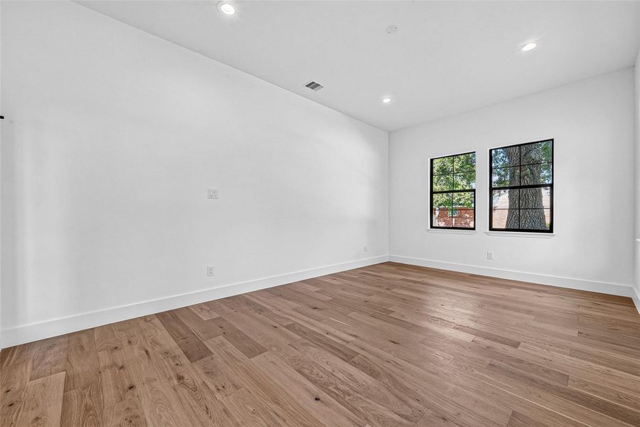 Large den/flex room with beautiful natural light with double French doors. Large den/flex room with beautiful natural light with double French doors.