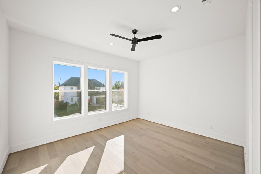 The next bedroom overlooks the front lawn and is a spacious 15x13!