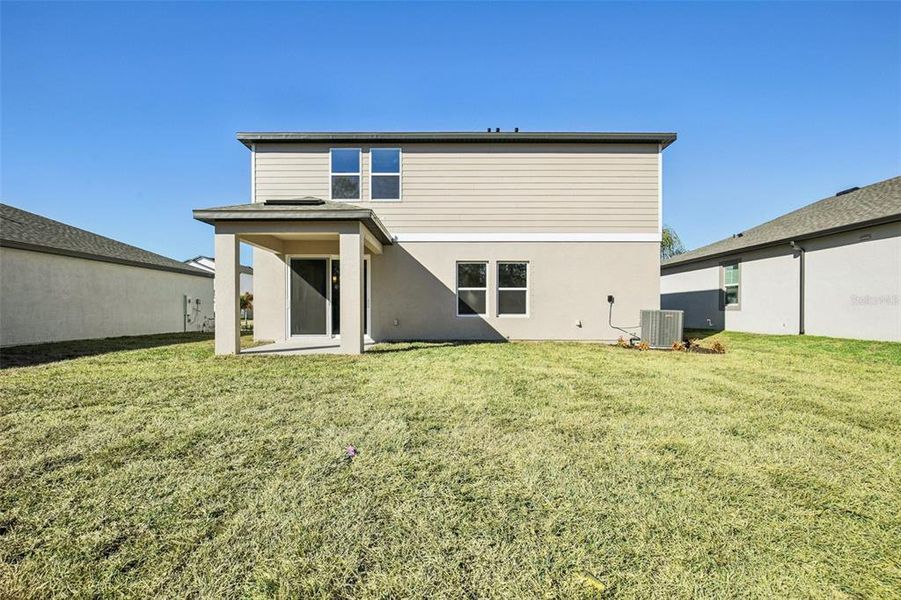 Exterior details and patio area of a home in Berry Bay, Wimauma (Image 21).
