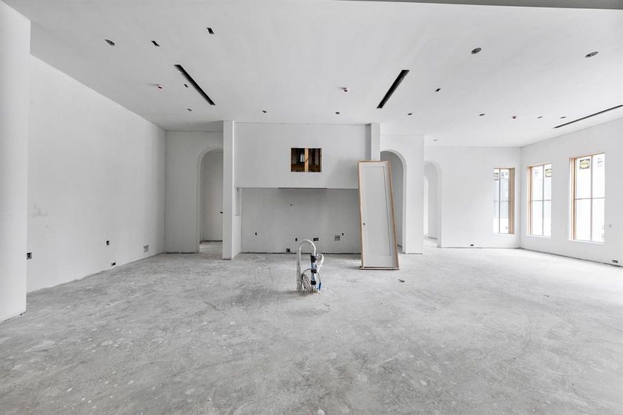 Notice the long custom range hood that will take up this entire back wall. To be completed with a one of a kind marble slab.