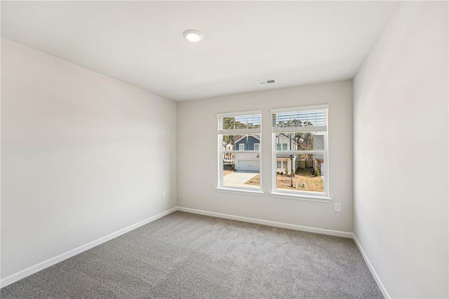 Spacious, unfurnished interior of a new home in Westmont Preserve, Powder Springs (Image 47).