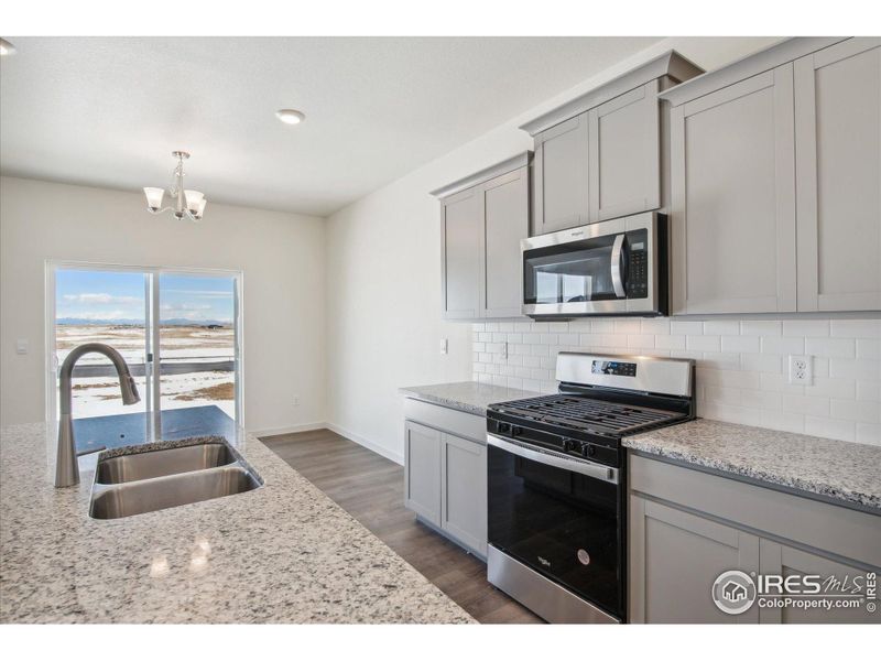 Furnished interior view inside a new home in Westgate, Greeley (Image 5).