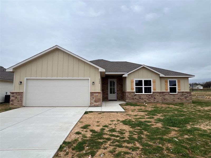 Front with Partial Gutters, Landscaping, Full Sprinkler System & Sod (to be installed)