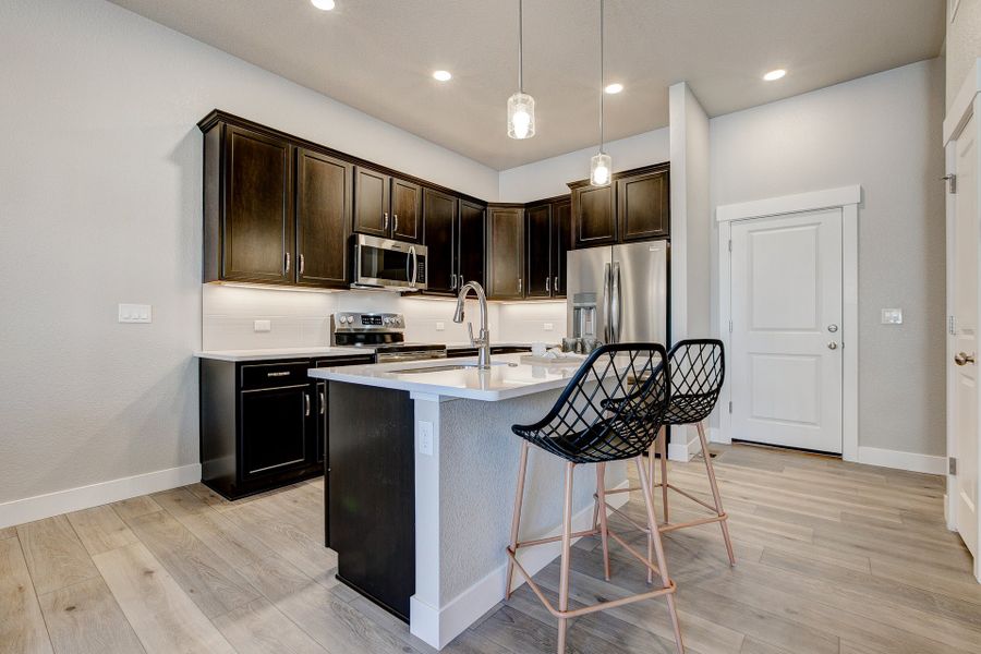 Representative furnished interior of a home built from the The Barrington by Landmark Homes in The Lakes at Centerra, Loveland (Image 7). Representative furnished interior of a home built from the The Barrington by Landmark Homes in The Lakes at Centerra, Loveland (Image 7).