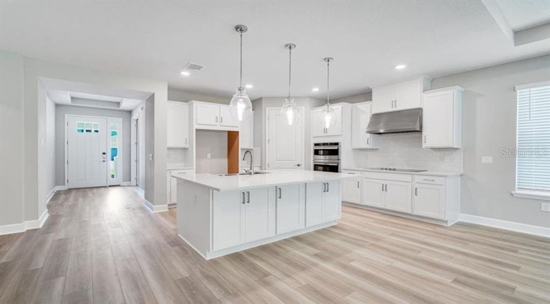 Furnished interior view inside a new home in The Cove at West Port, Port Charlotte (Image 8).