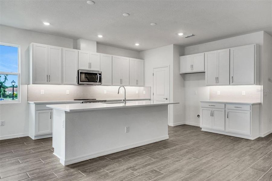Furnished interior view inside a new home in Tuscan Hills, Dade City (Image 10).