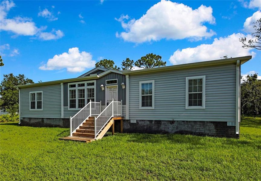 Front exterior of a new home in , Homosassa, FL, highlighting curb appeal (Image 28).