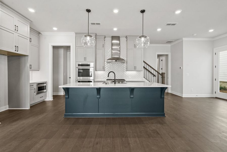 Representative furnished interior of a home built from the The Osbourne by The Providence Group in Waterhaven, Cumming (Image 10).