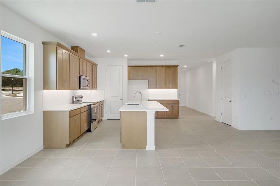 Furnished interior view inside a new home in Tuscan Hills, Dade City (Image 17).