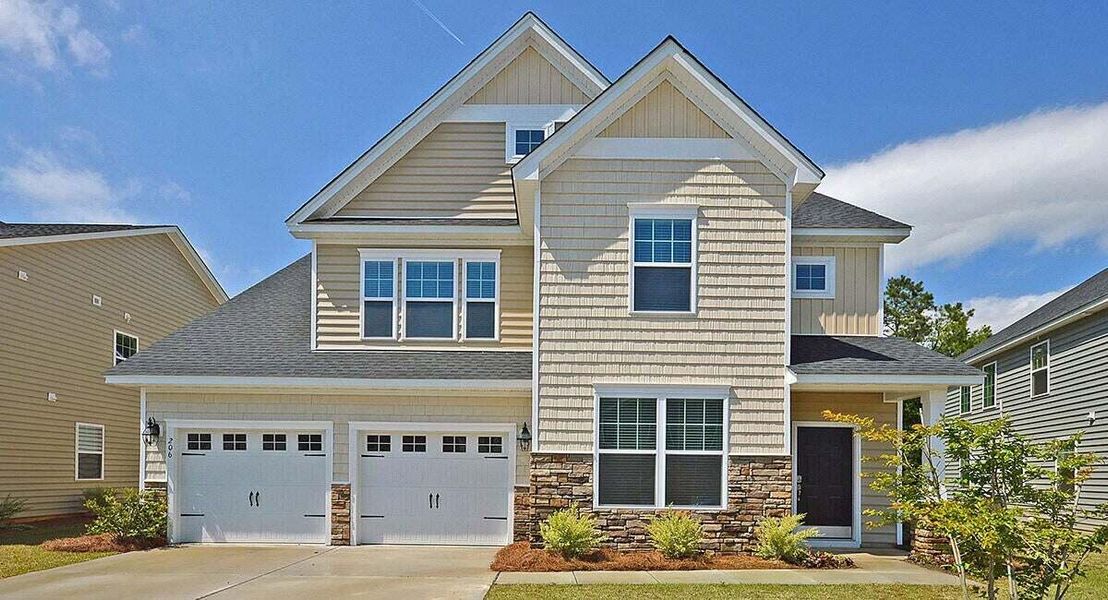 Front exterior of a new home in Cypress Preserve, Moncks Corner, SC, highlighting curb appeal (Image 1). Front exterior of a new home in Cypress Preserve, Moncks Corner, SC, highlighting curb appeal (Image 1).