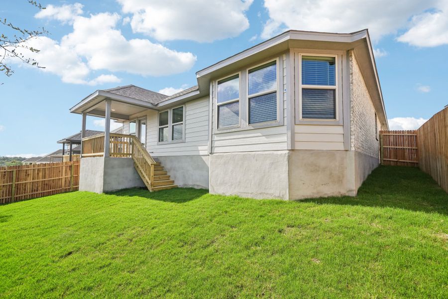 Back exterior of the Preston floorplan at a Meritage Homes community.