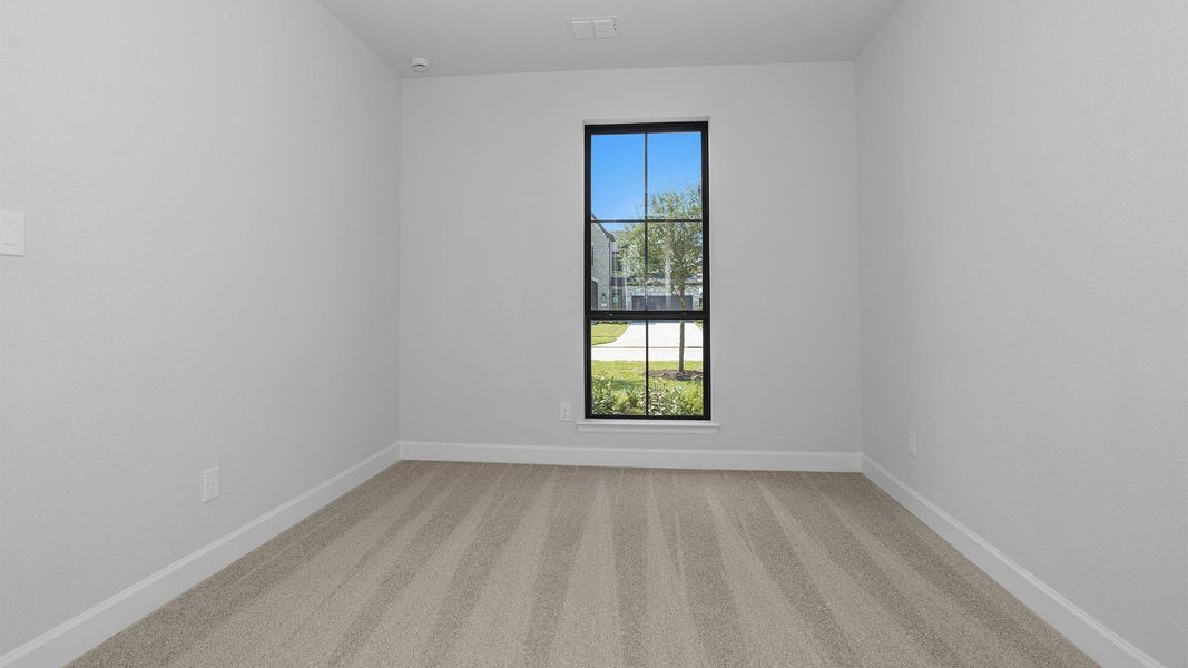 Spacious, unfurnished interior of a new home in Legacy Prairie at Katy Court, Katy (Image 11).