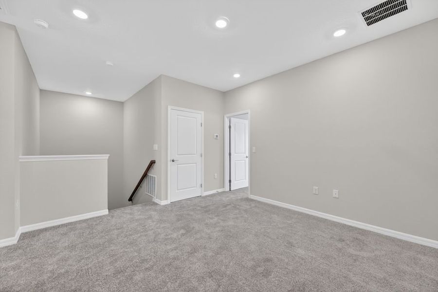 Representative unfurnished interior of a home built from the Bellflower by Taylor Morrison in Cherry Elm at SilverLeaf, St. Augustine (Image 15).