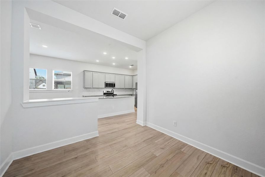 Spacious, unfurnished interior of a new home in The Groves 35', Humble (Image 31).
