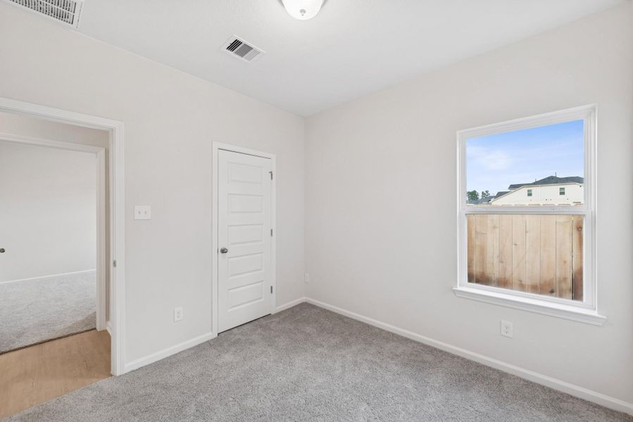 The Cardinal II-Bedroom 3. Photos of home shown are for illustration only; actual features, colors, and upgrades may vary.