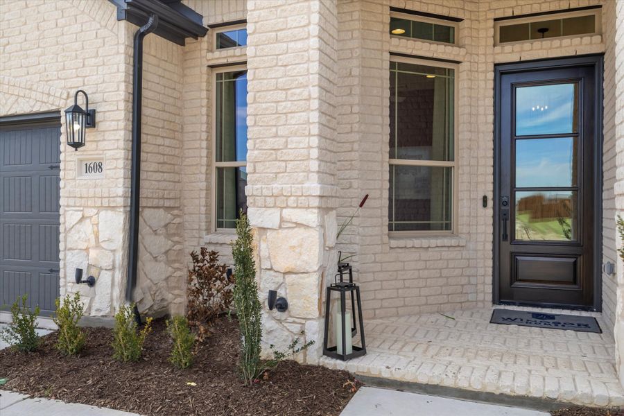 Exterior details and patio area of a home in Anna Town Square, Anna (Image 2).