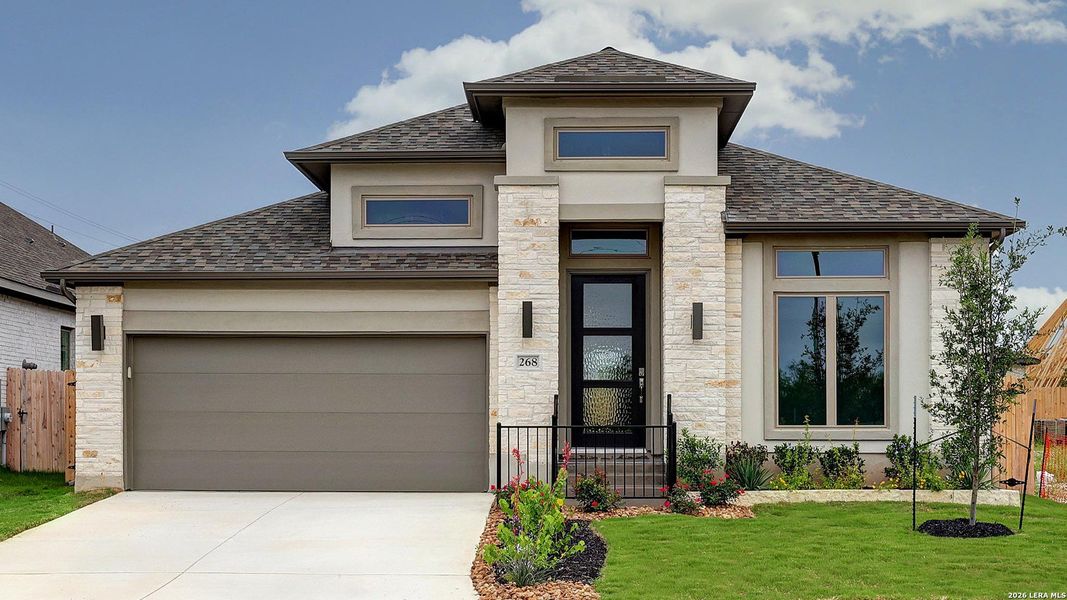 Front exterior of a new home in Haby Hill, San Antonio, TX, highlighting curb appeal (Image 2).