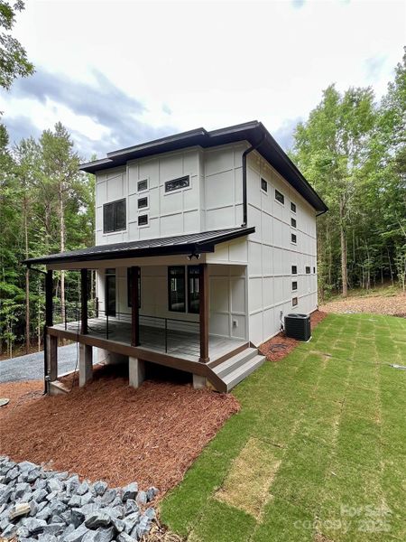 Covered Deck/Porch and sodded side yard Covered Deck/Porch and sodded side yard