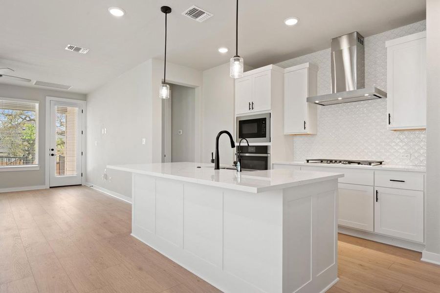 Furnished interior view inside a new home in Heritage, Dripping Springs (Image 6).
