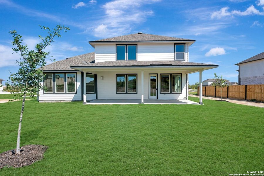Front exterior of a new home in Everly Estates, San Antonio, TX, highlighting curb appeal (Image 18). Front exterior of a new home in Everly Estates, San Antonio, TX, highlighting curb appeal (Image 18).