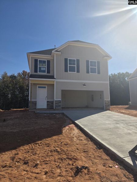 Exterior details and patio area of a home in Rolling Hills, Prosperity (Image 3).
