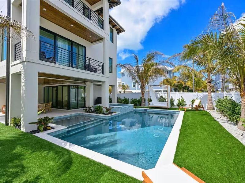 Exterior details and patio area of a home in , Bradenton Beach (Image 25).