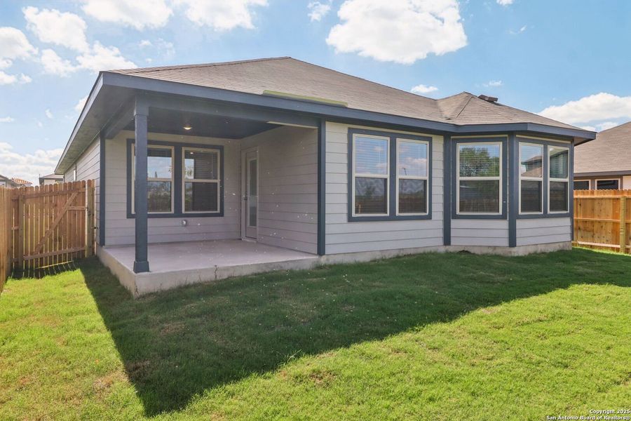 Exterior details and patio area of a home in Catalina, Converse (Image 24).