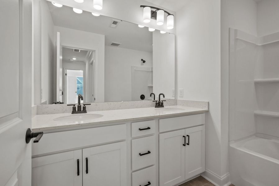 Representative furnished interior of a home built from the Billander by Pulte Homes in Cannon Run, Concord (Image 10).