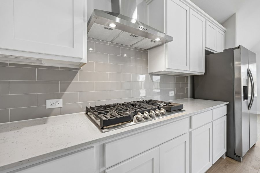 Kitchen in the Gilmour II home plan by Trophy Signature Homes