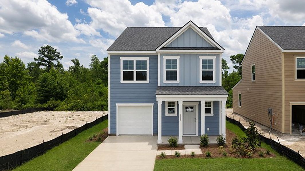 Front exterior of a new home in Sheep Island, Summerville, SC, highlighting curb appeal (Image 1). Front exterior of a new home in Sheep Island, Summerville, SC, highlighting curb appeal (Image 1).