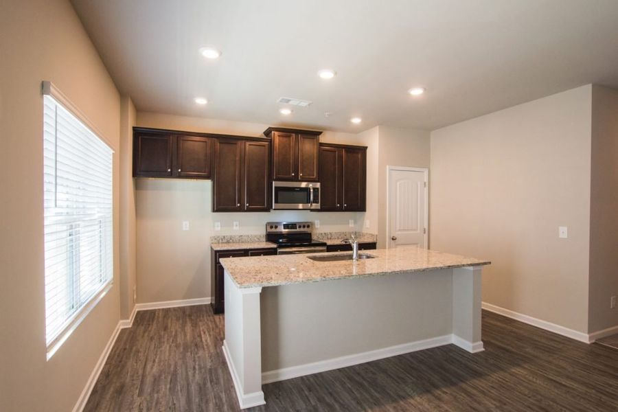 Representative furnished interior of a home built from the Cadence Unit B by Piedmont Residential in Ross Pointe, Kennesaw (Image 5).