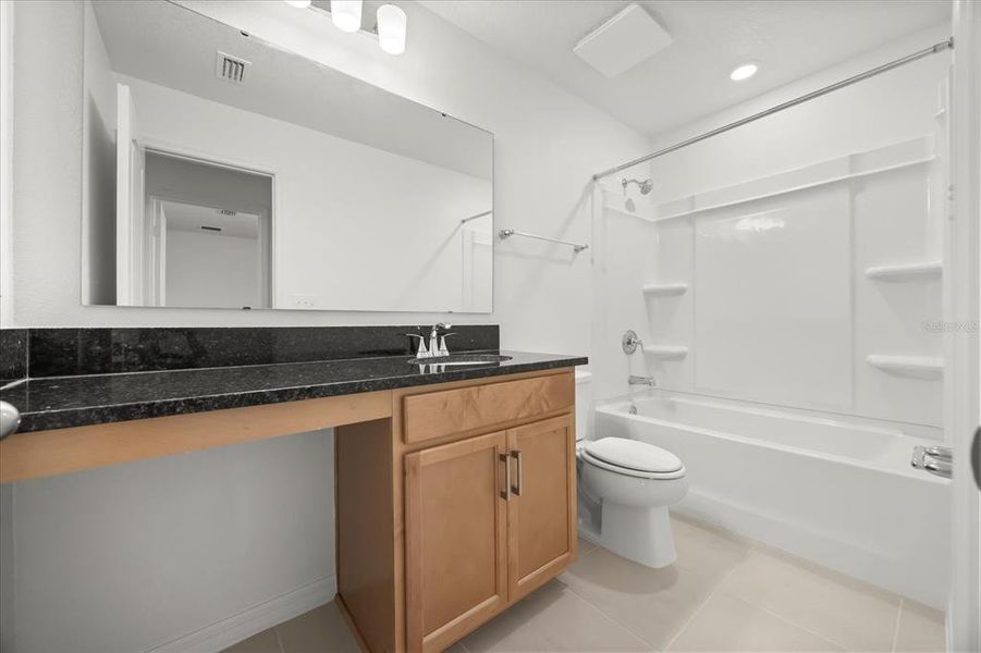 Furnished interior view inside a new home in Hickory Ranch, Auburndale (Image 8).