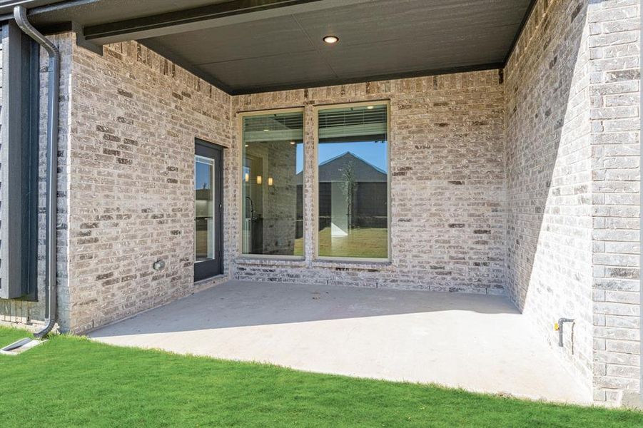 Exterior details and patio area of a home in Union Park Classic 55, Little Elm (Image 27). Exterior details and patio area of a home in Union Park Classic 55, Little Elm (Image 27).