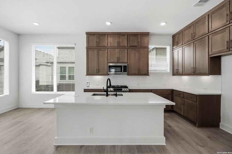 Furnished interior view inside a new home in Centero at Stone Oak, San Antonio (Image 8).