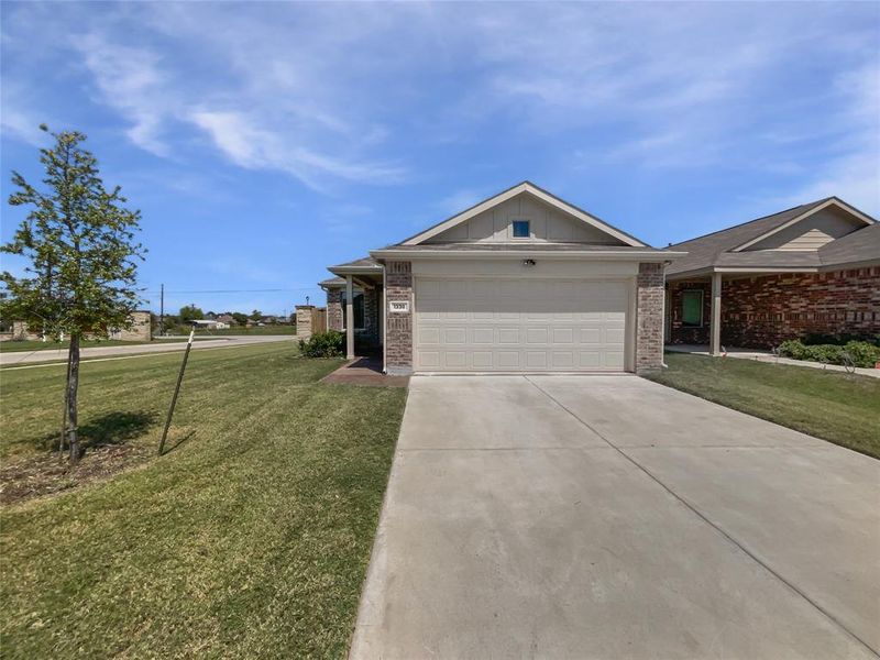 Front exterior of a new home in , Forney, TX, highlighting curb appeal (Image 18).