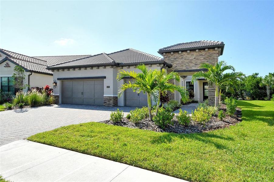 Front exterior of a new home in , Nokomis, FL, highlighting curb appeal (Image 23).