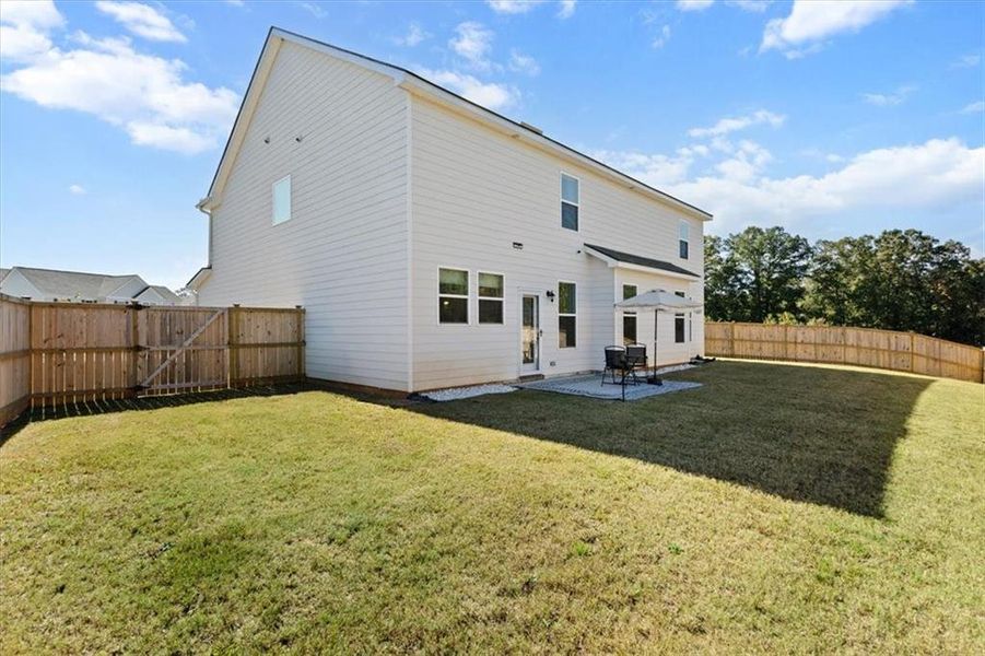 Exterior details and patio area of a home in , Locust Grove (Image 21). Exterior details and patio area of a home in , Locust Grove (Image 21).