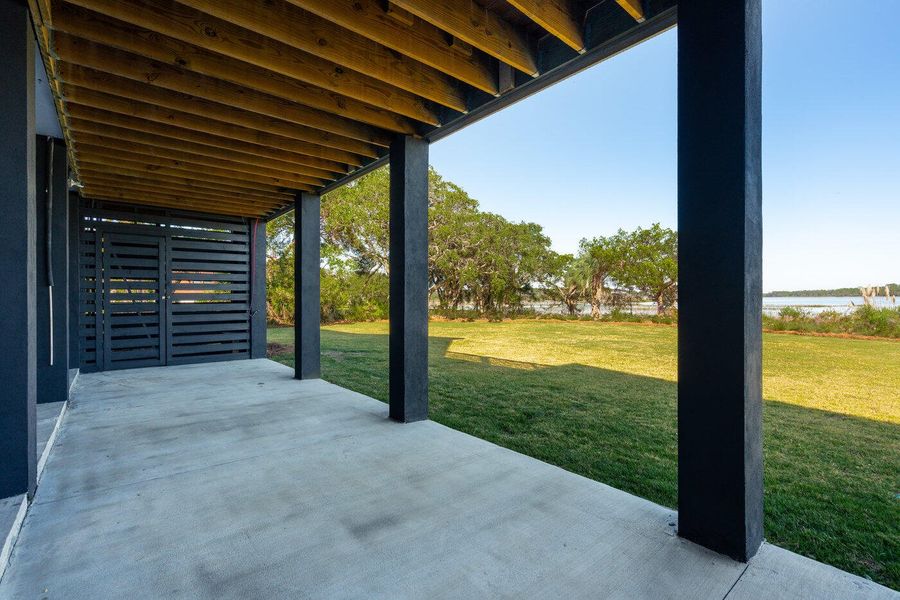 Exterior details and patio area of a home in , Charleston (Image 50).