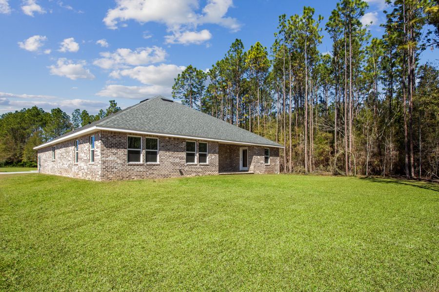 Representative exterior photo of a completed home built from the The Turquoise by Herbst Homes in Clear Water Landing, Milton, FL (Image 61).